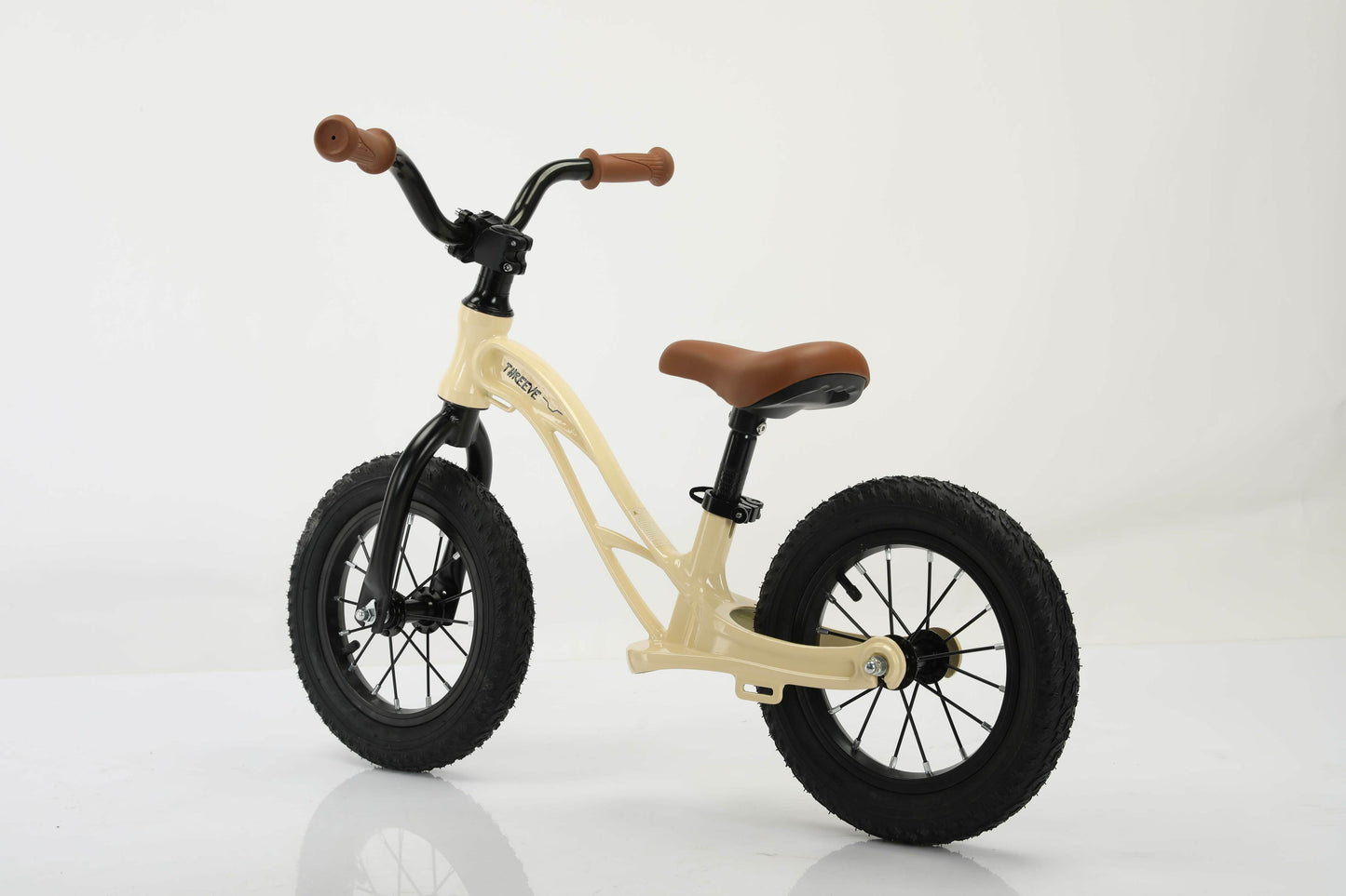 BC Racer beige vintage-style balance bike for toddlers with low step-through frame.