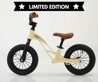 BC Racer beige vintage-style balance bike for toddlers with low step-through frame.